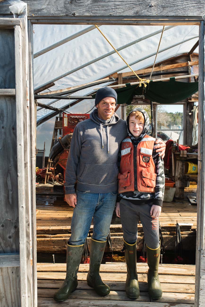 A portrait of Chris Warner and son Garrett of High Tide Oyster Farm.